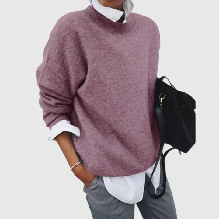 Isabellynn relaxed knit sweater in pink, worn over a white shirt, front view