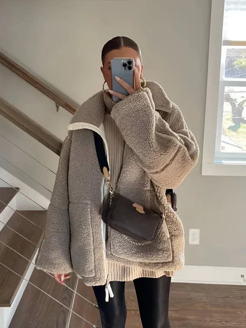 Araminta oversized teddy jacket in brown, three-quarter view with pockets