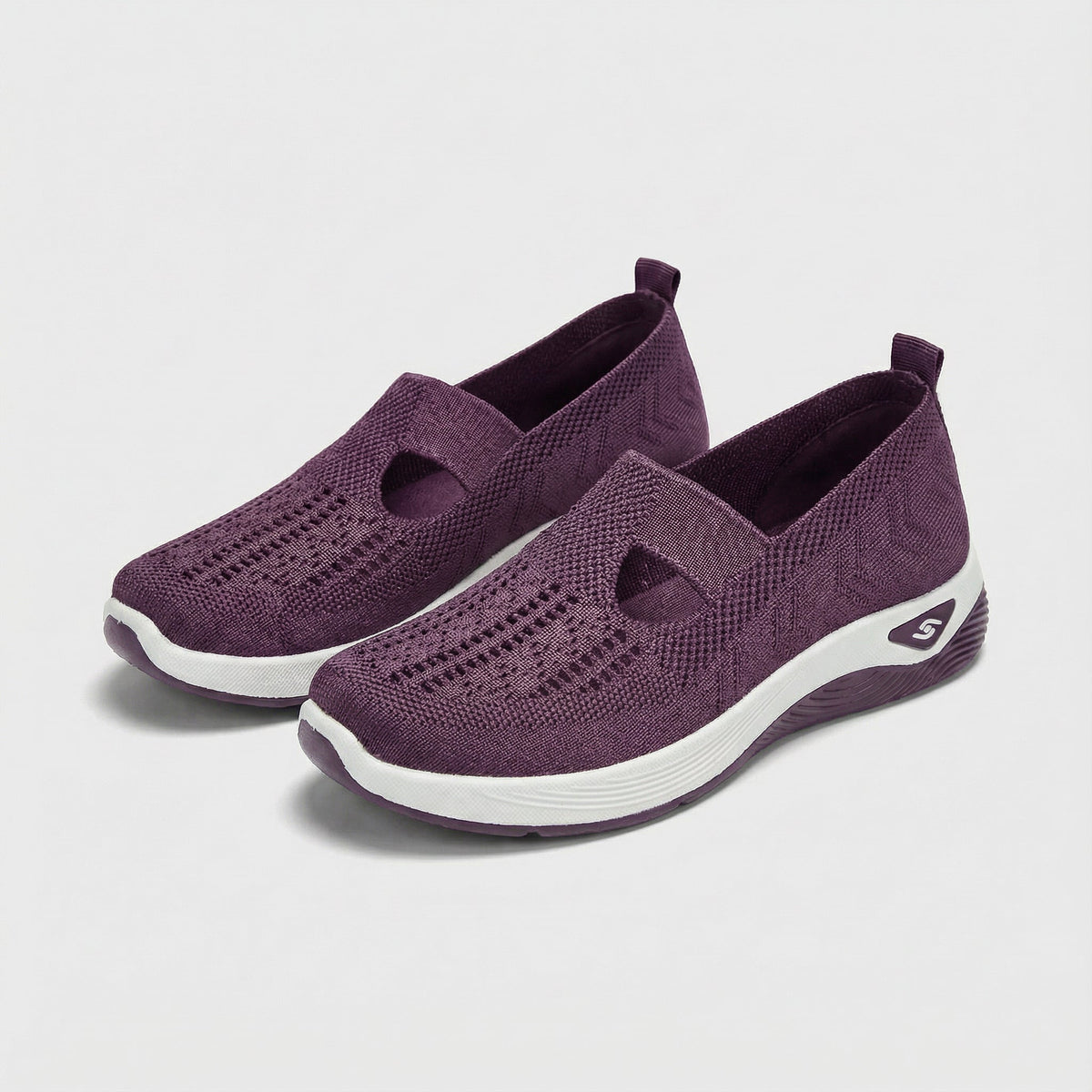 Carry knitted slip-on shoes in deep purple, angled pair view