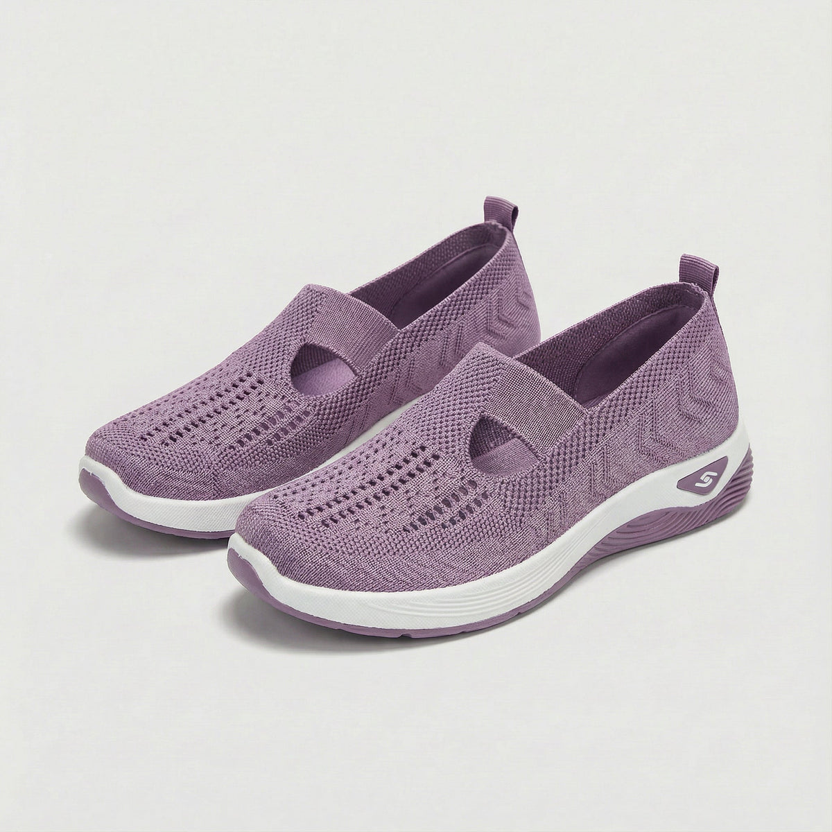 Carry knitted slip-on shoes in light purple, angled pair view