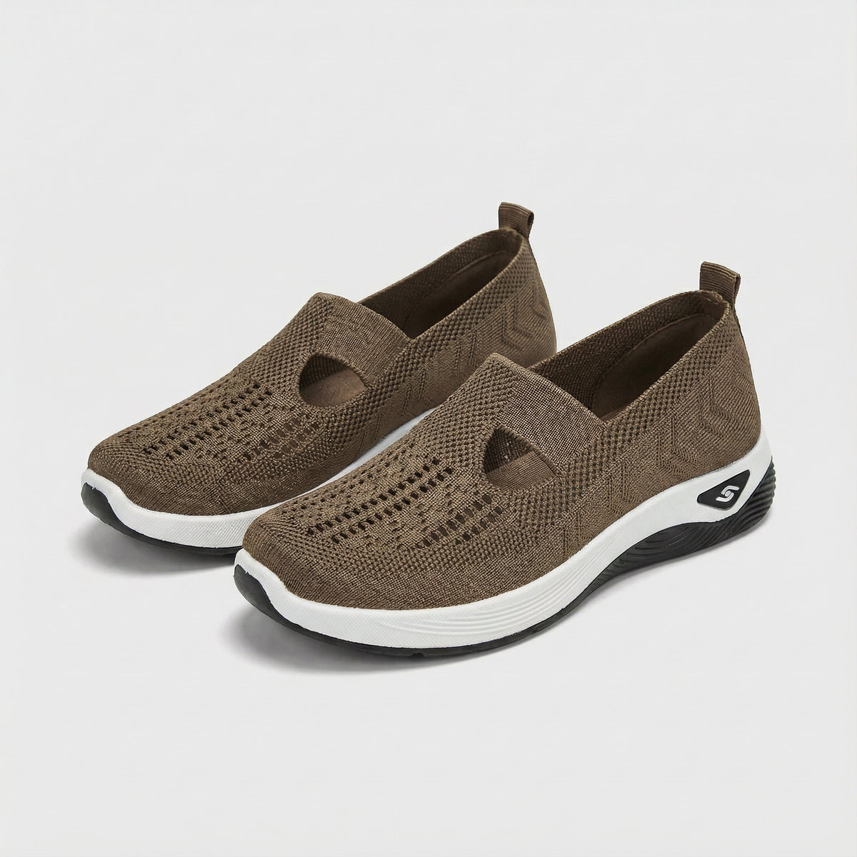 Carry knitted slip-on shoes in khaki, angled pair view