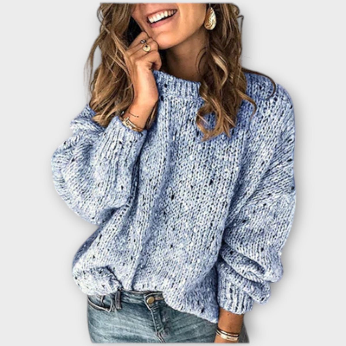 Florencia speckled knit sweater in blue, front view with ribbed hem