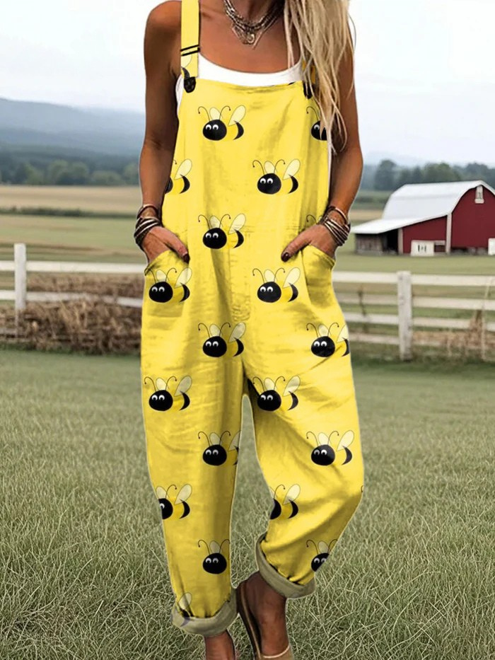 Bumble Bliss dungarees in yellow with bee print, full-length front view