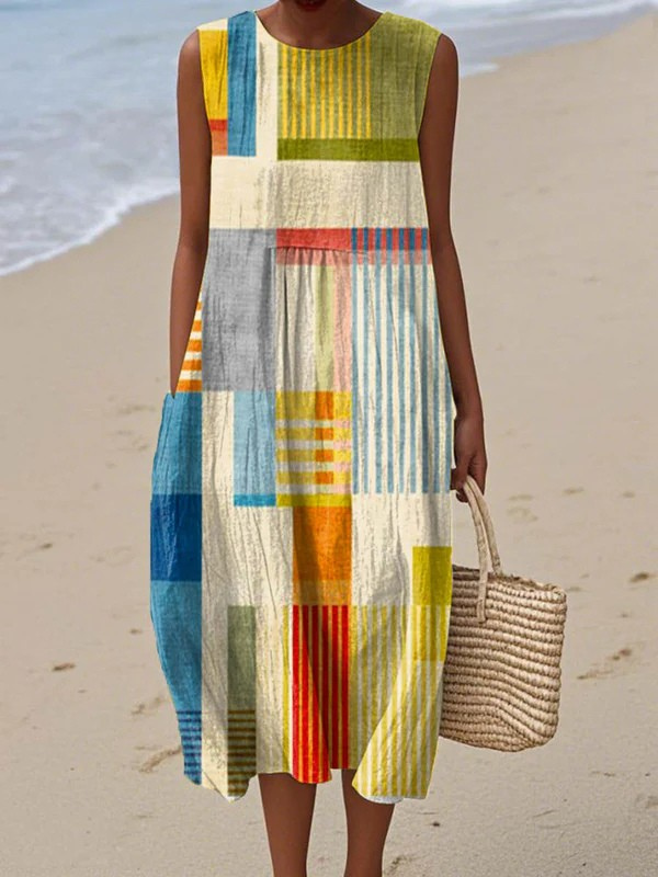 Eve geometric midi dress in multicolour, full-length front view on the beach