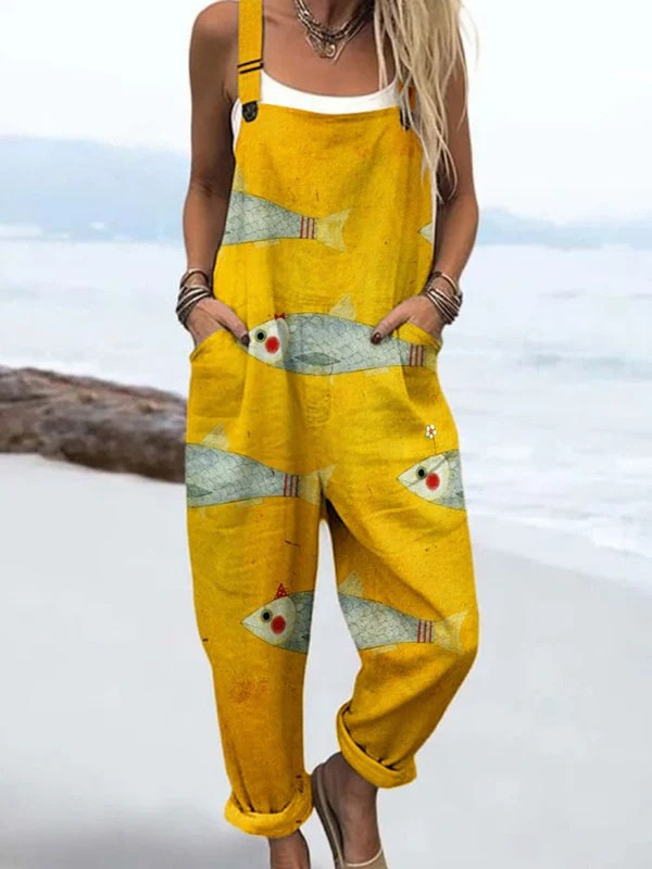 Sunny Swimmer dungarees in yellow with fish print, full-length front view