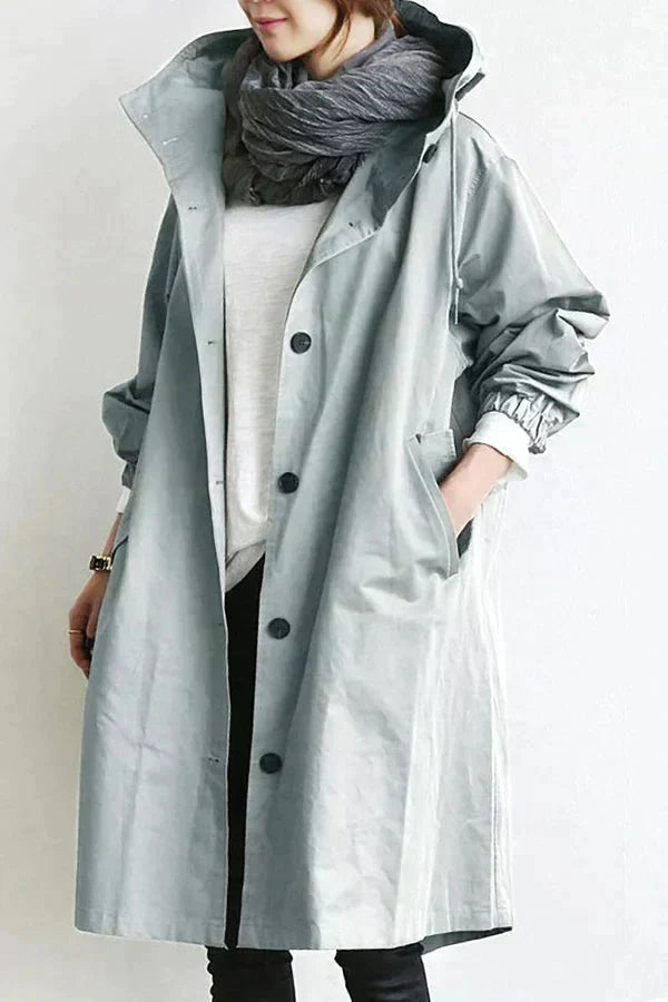 Callindra hooded trench coat in light grey, front view worn open
