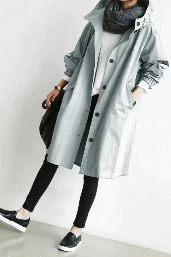 Callindra trench coat in light grey, full-length front view with trainers