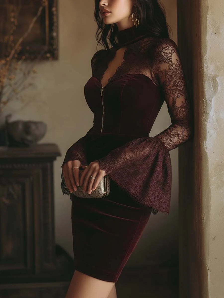 Tamsin bordeaux velvet mini dress worn with a clutch, side view
