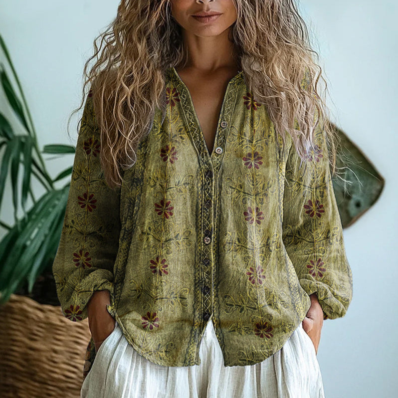 Avis vintage print blouse in green, front view with buttoned placket