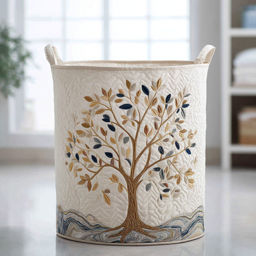 Aurora hand-quilted laundry basket in cream with embroidered tree design