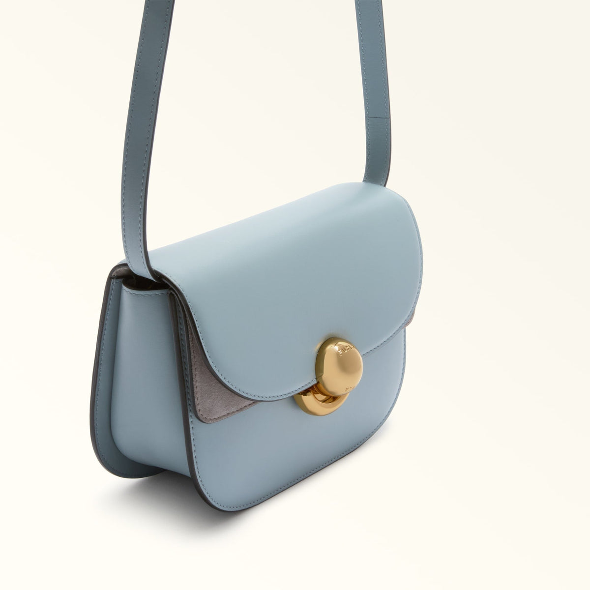 Zanélle mini shoulder bag in light blue, close-up of clasp and two-tone panel