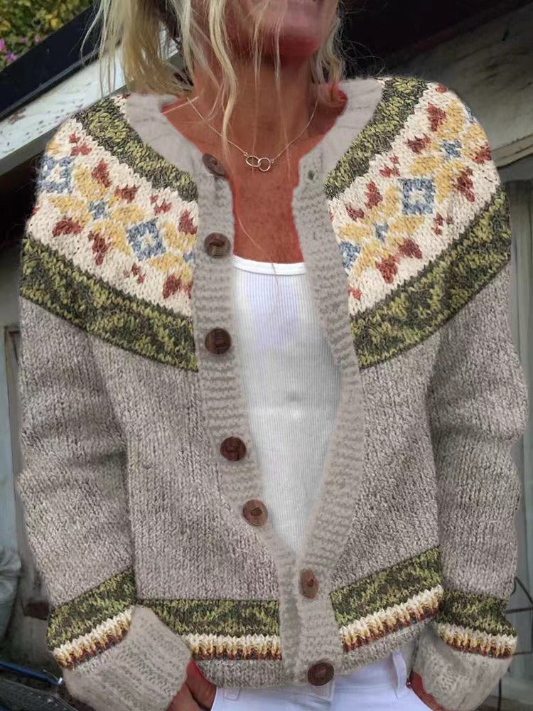 Close-up of cream Icelandic cardigan yoke pattern and wooden buttons