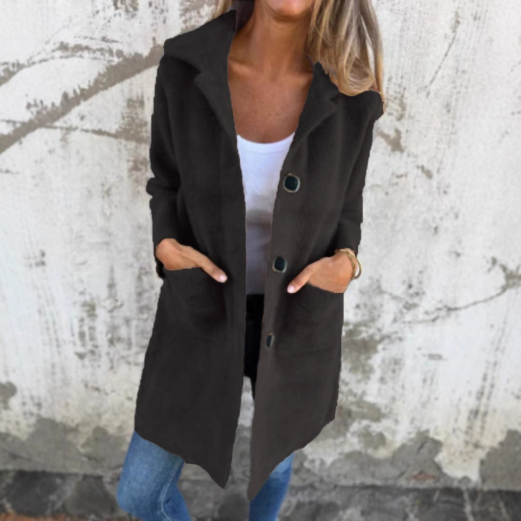 Morwenna long button coat in black, front view with patch pockets