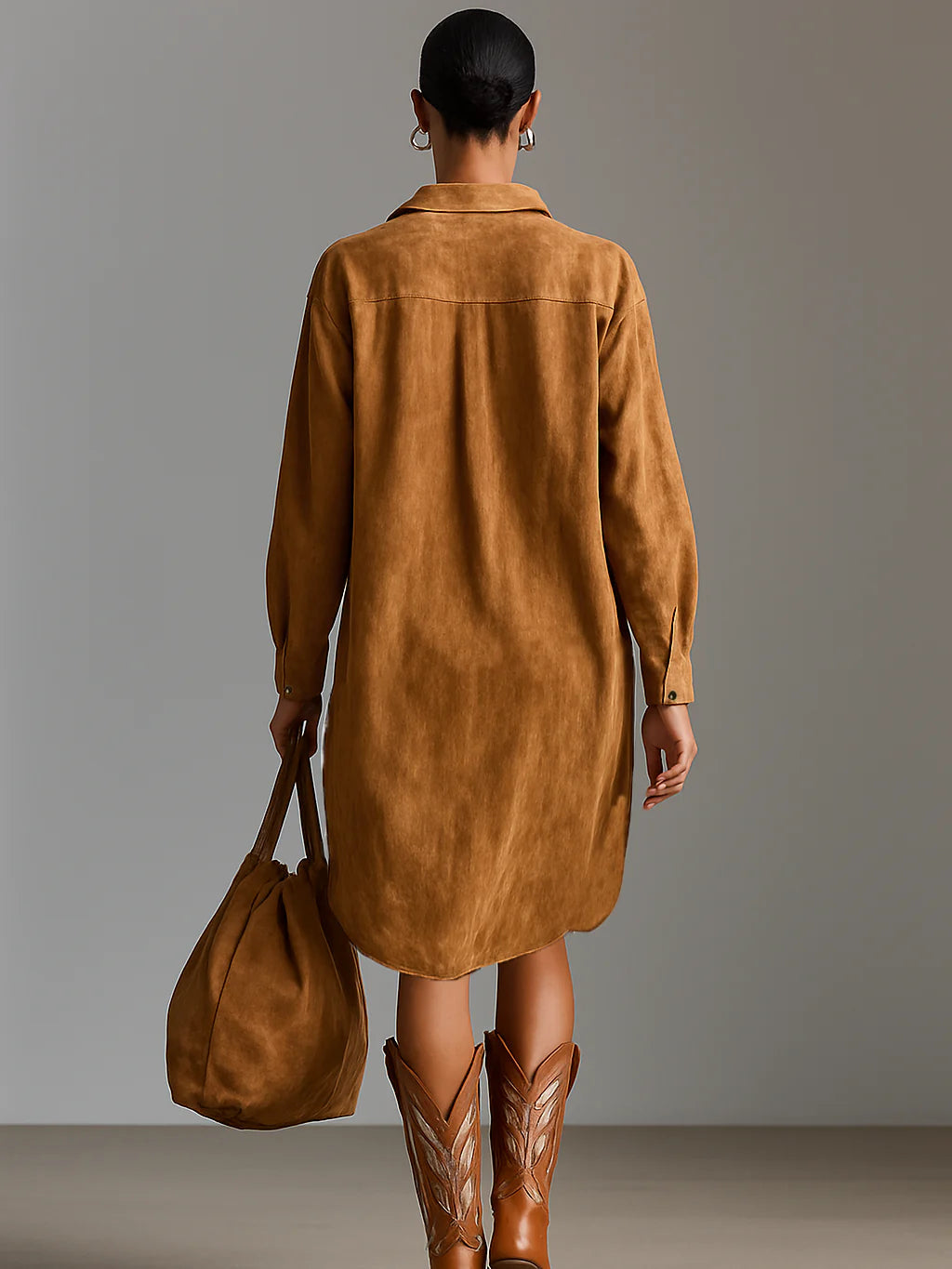 Sybil midi dress in brown, back view showing curved shirt-tail hem