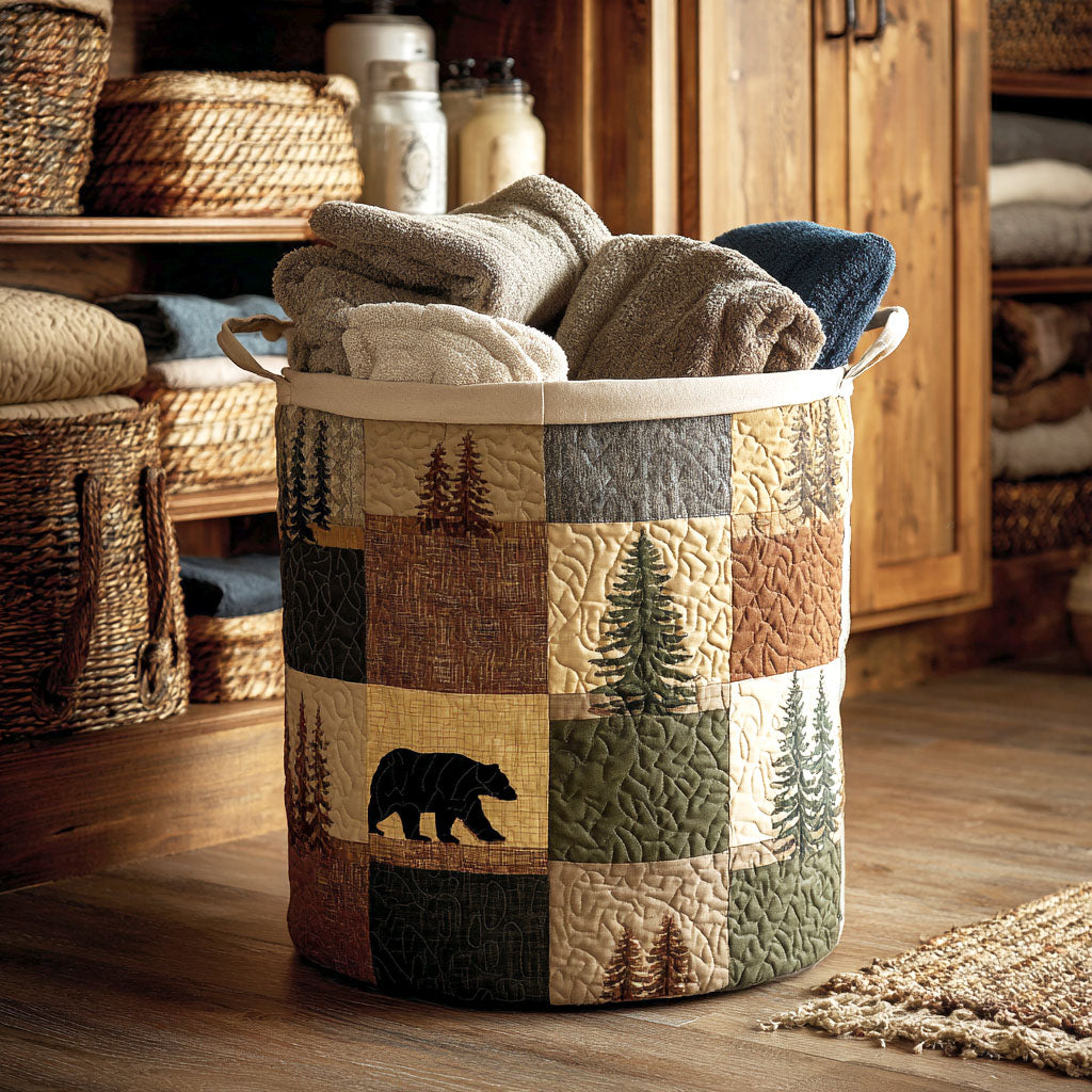 Silvana hand-quilted laundry basket with woodland patchwork and bear, filled with towels