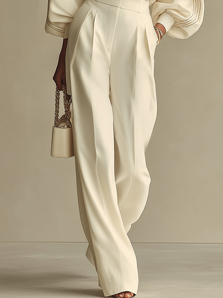 Sophie ivory suit trousers, close view of pleated high waist and wide legs