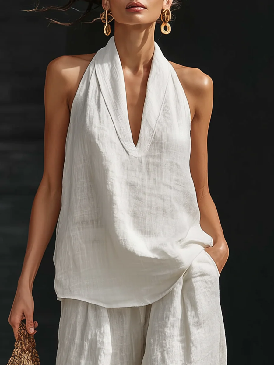 Lila sleeveless top in white, close-up of draped V-neckline