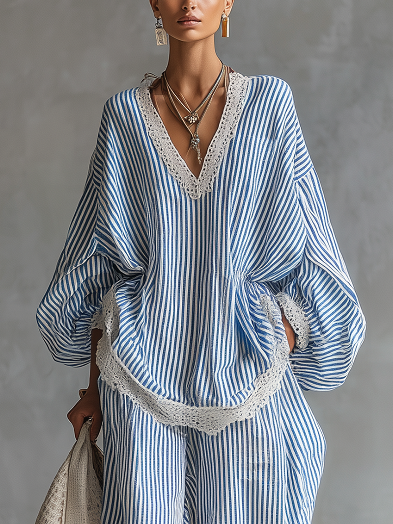 Sofia striped top in blue, close-up of lace neckline and hem trim