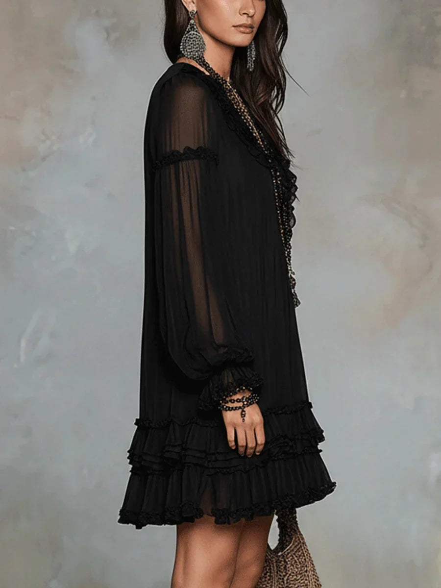 Aurelia ruffle trim mini dress in black, side view showing tiered hem