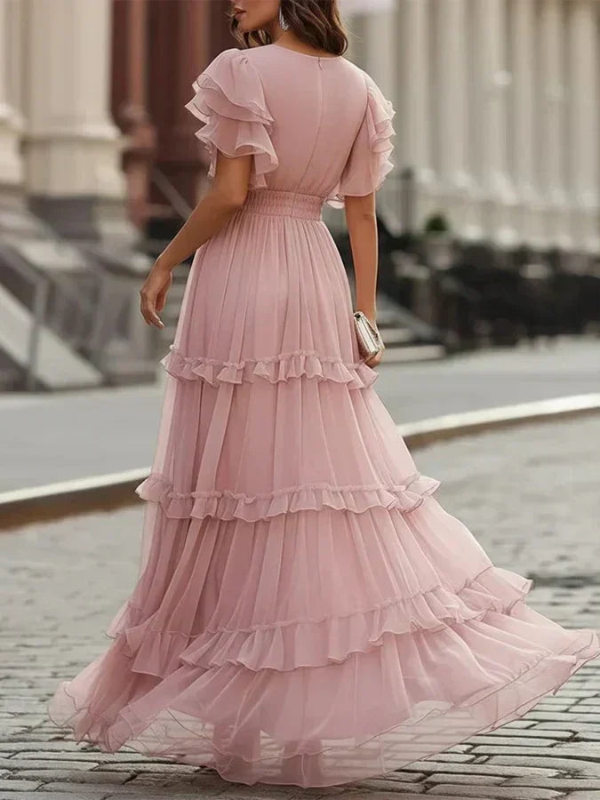 Charlotte blush pink maxi dress, back view showing shirred waist and ruffled tiers