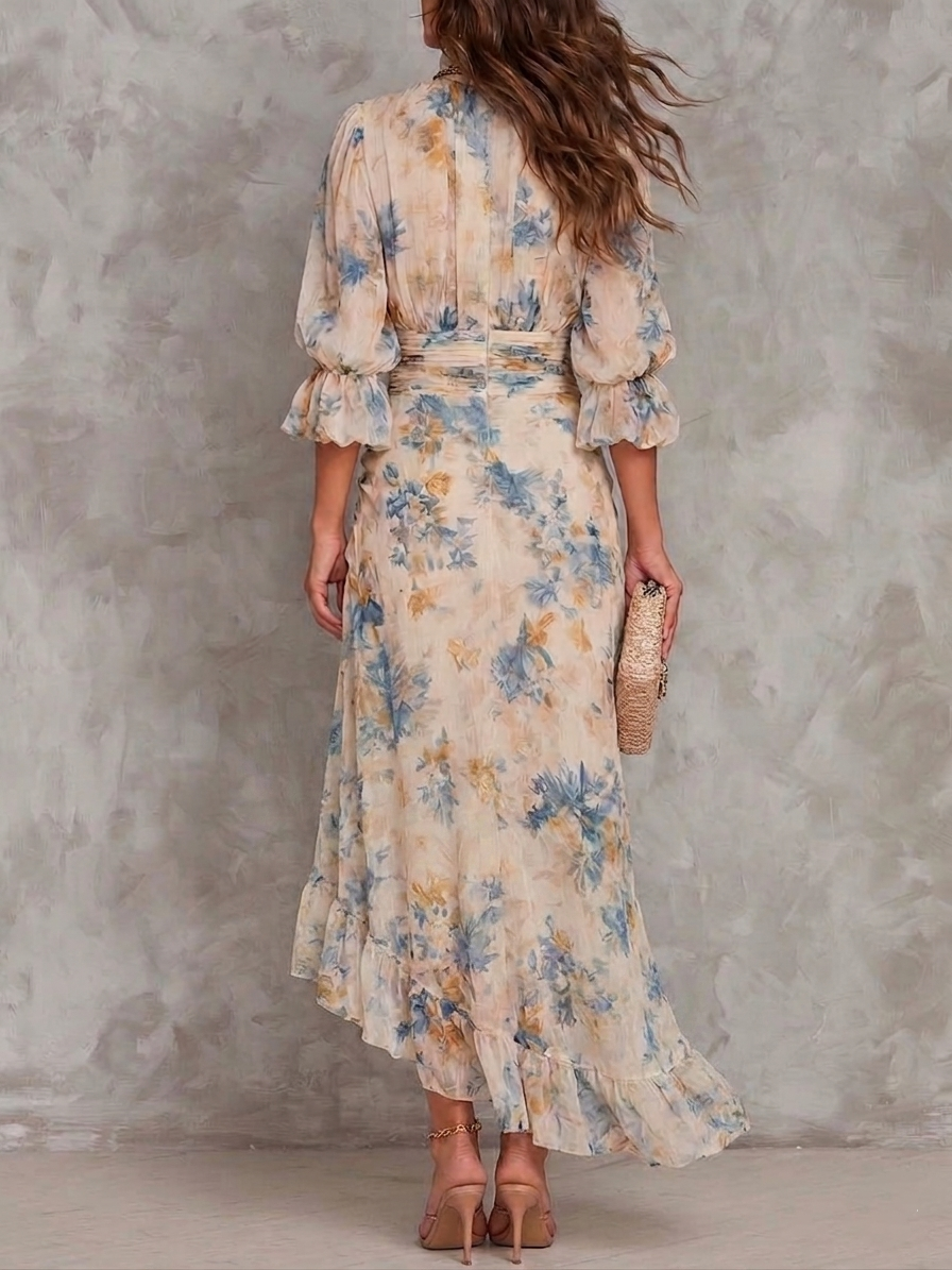 Daphne floral maxi dress in cream, back view showing ruffled hem