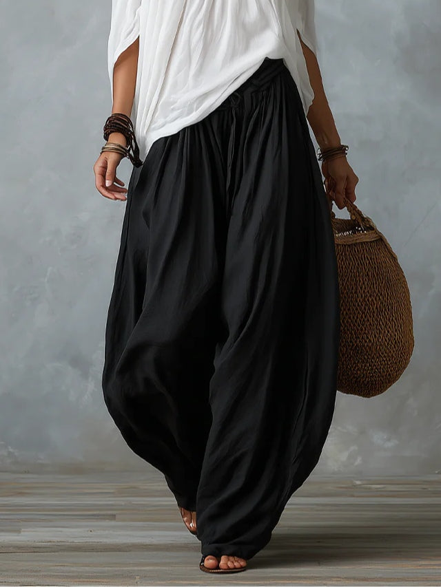 Raffaella lantern trousers in black, close-up of drawstring waist