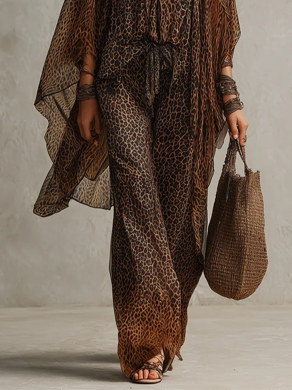 Close view of leopard wide-leg trousers with tie waist and gradient hem