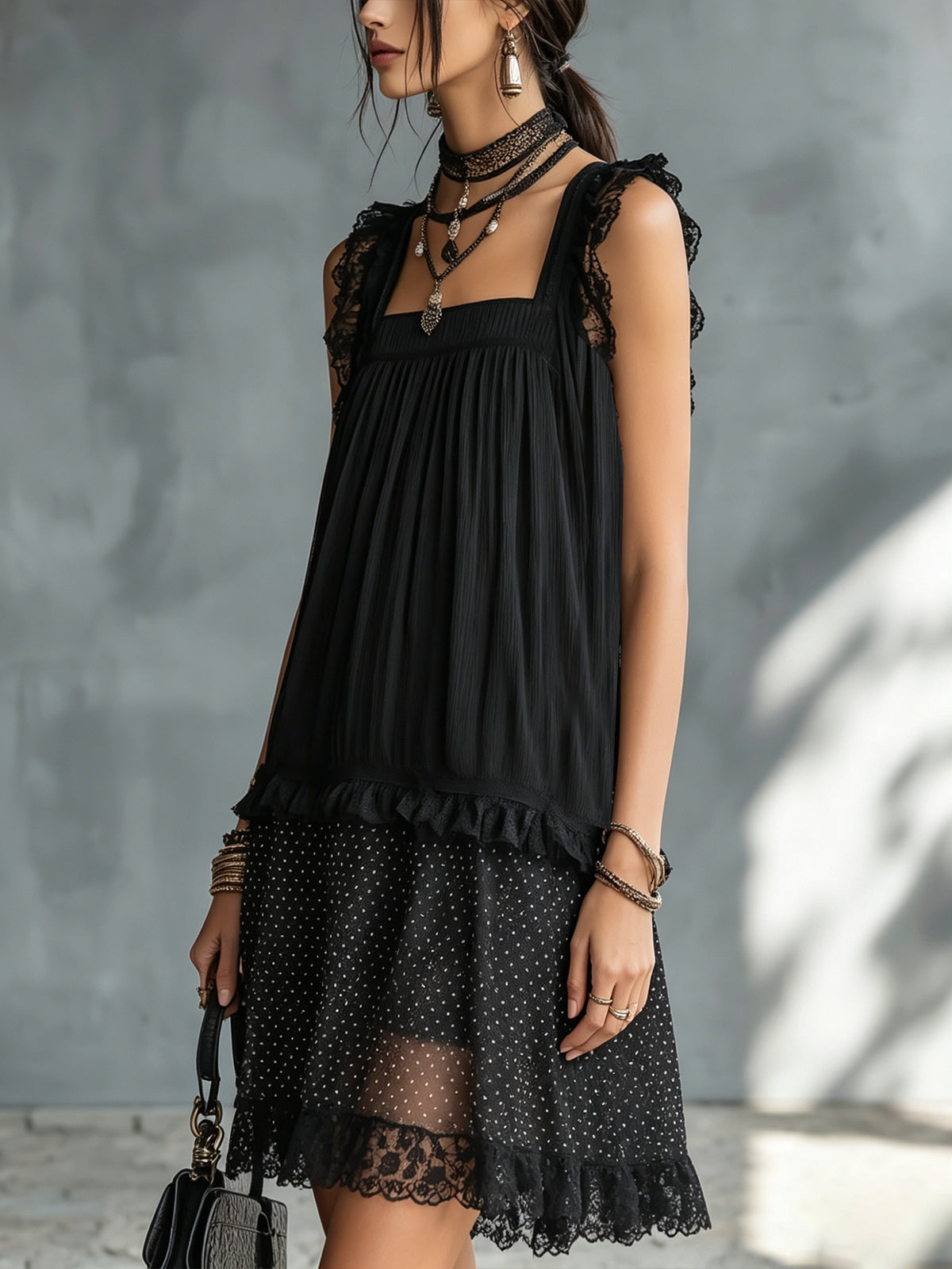 Pauline polka-dot mini dress in black, three-quarter side view