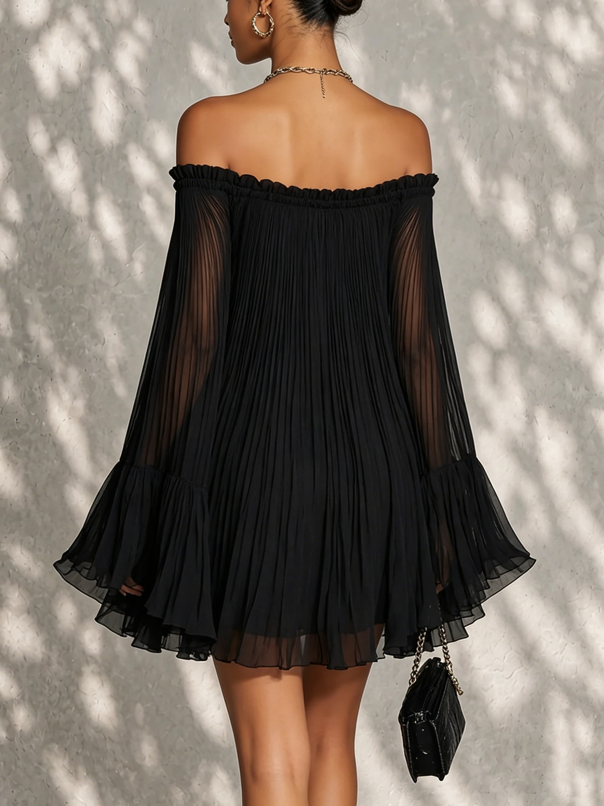Océane black off-shoulder mini dress, back view on model