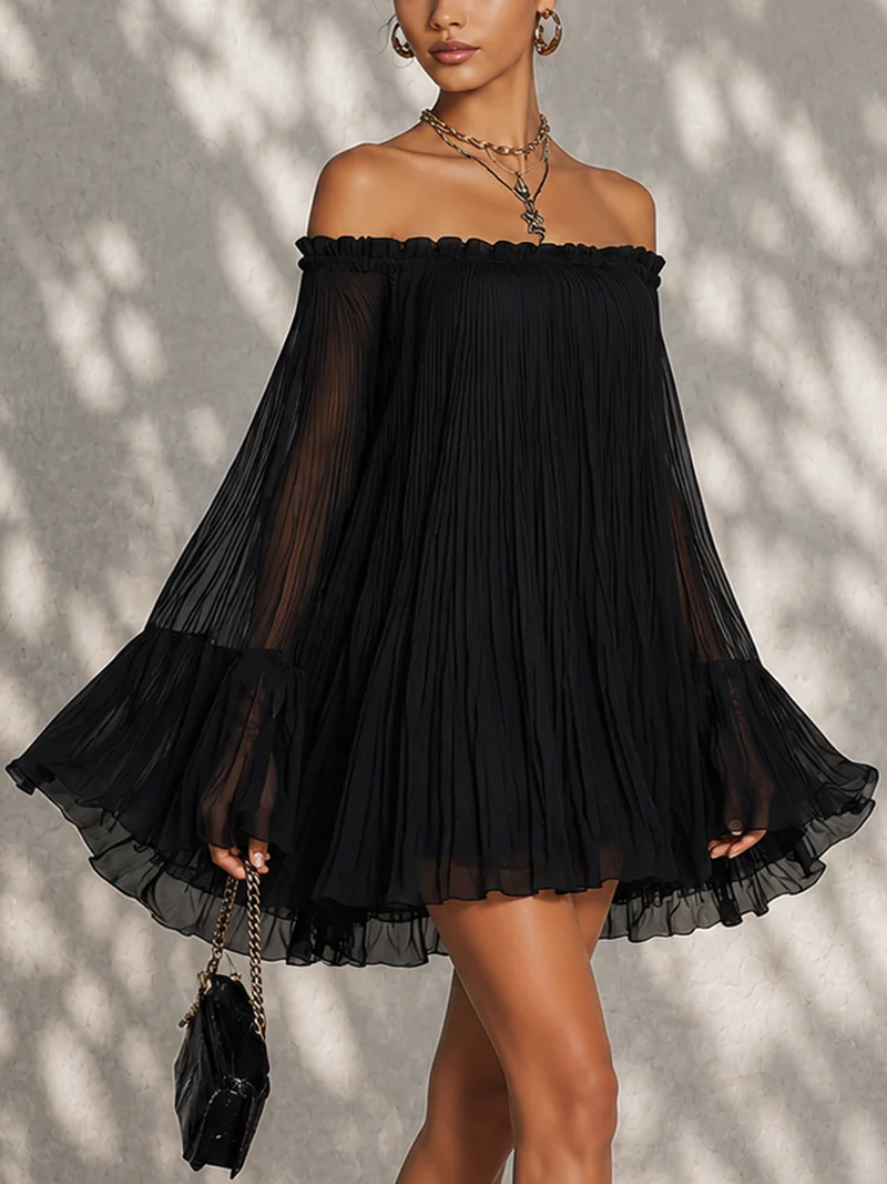 Océane black mini dress, front view showing flared skirt and ruffled hem