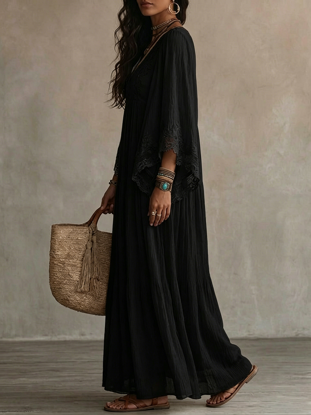 Ravenna black maxi dress, side view showing lace sleeve cuffs