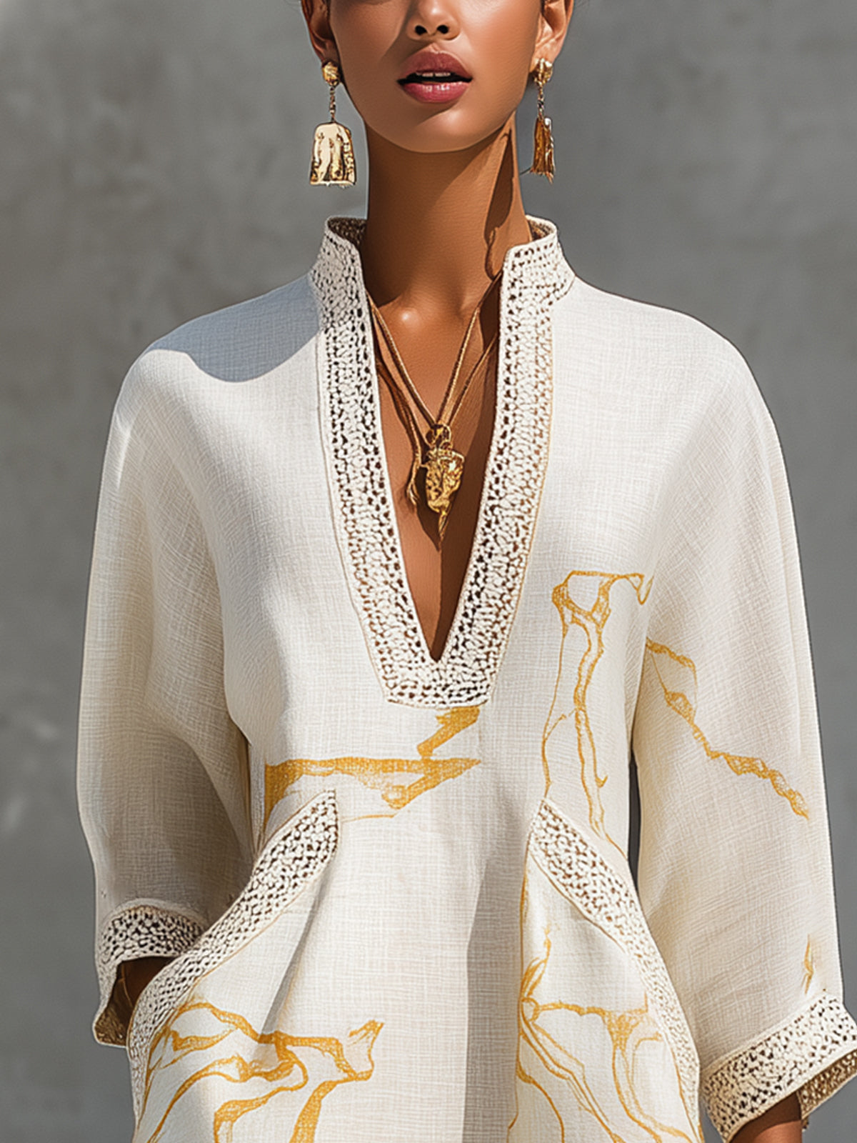 Close-up of deep V-neckline and crochet lace collar on the Aliénor dress