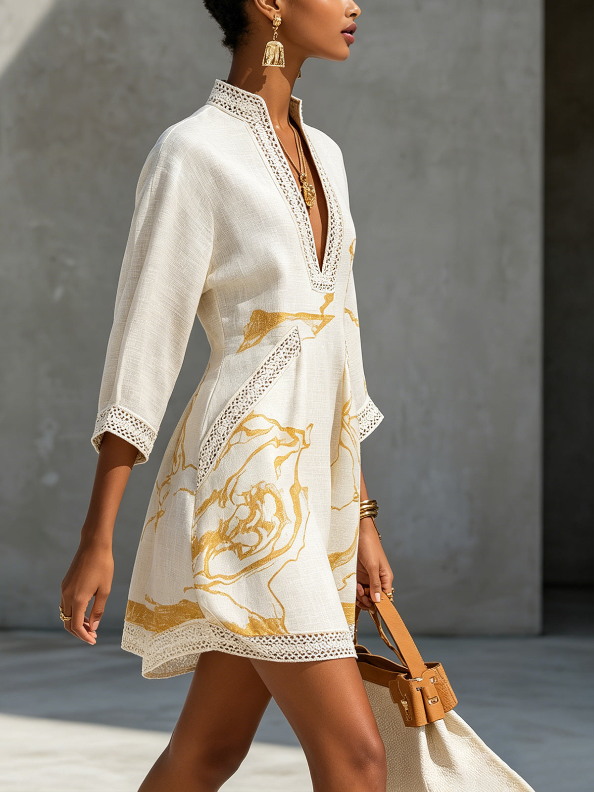 Aliénor mini dress in ivory, side view showing flared hem
