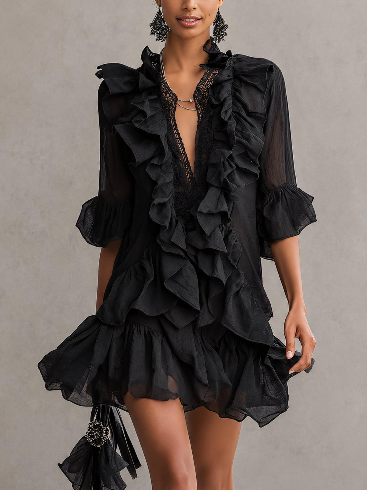 Anaïs ruffle mini dress in black, front view with lace V neckline