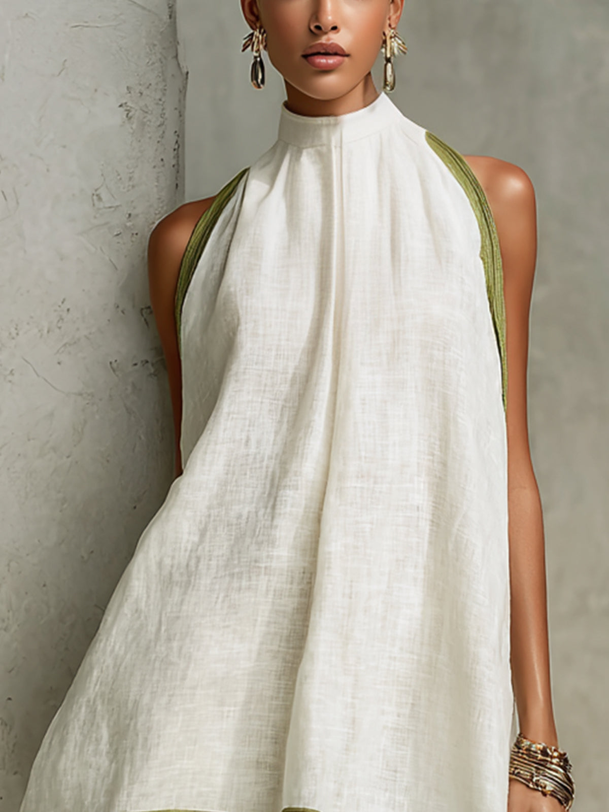 Close-up of Agathe dress high gathered neck and olive shoulder trim