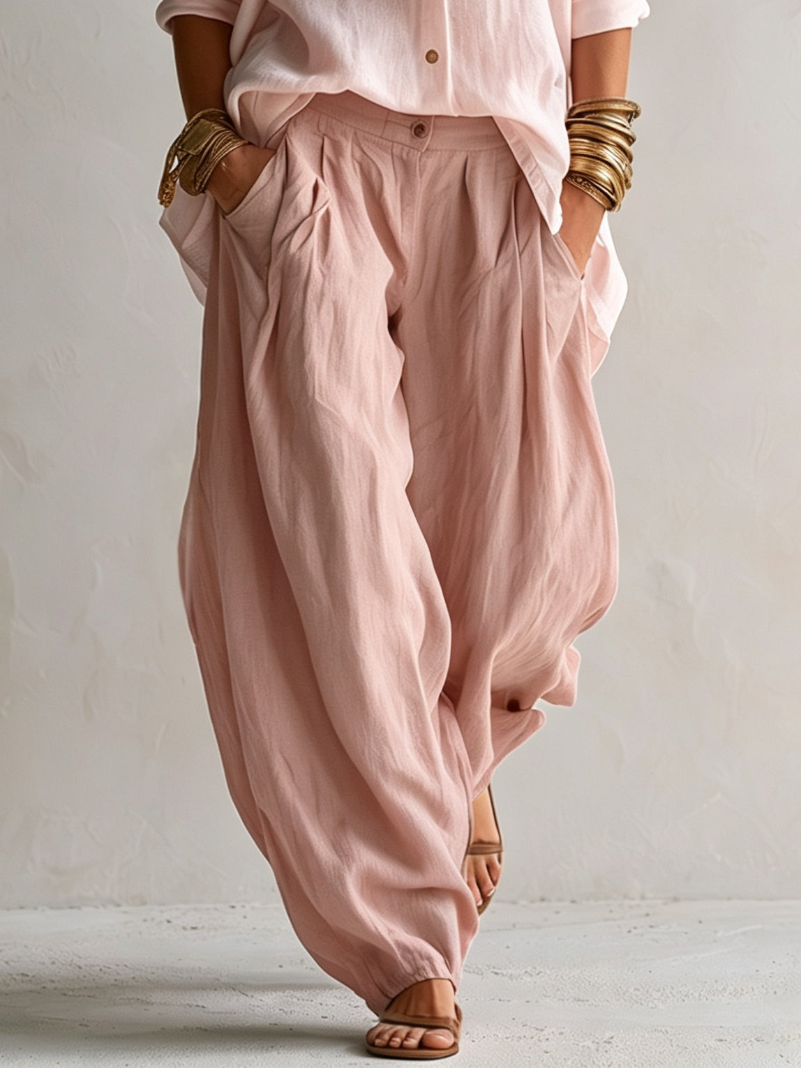 Capucine soft pink lantern trousers with side pockets, close-up view