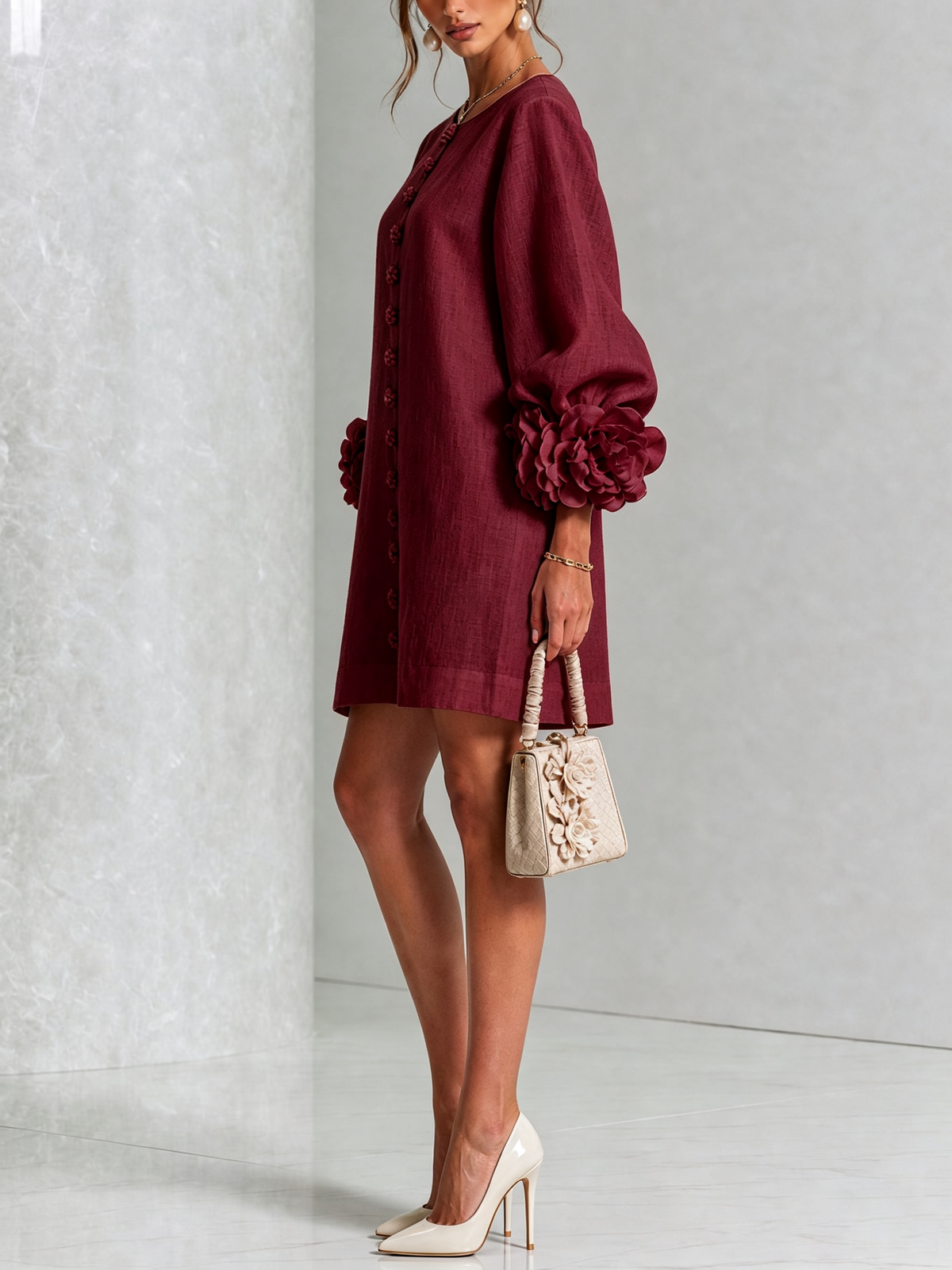 Ilaria burgundy mini dress, side view with floral buttons