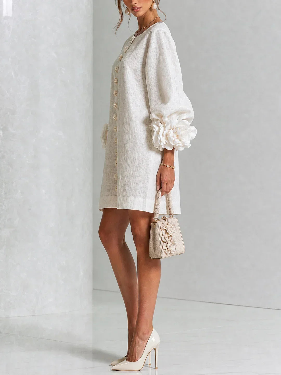 Elvira mini dress in white, side view