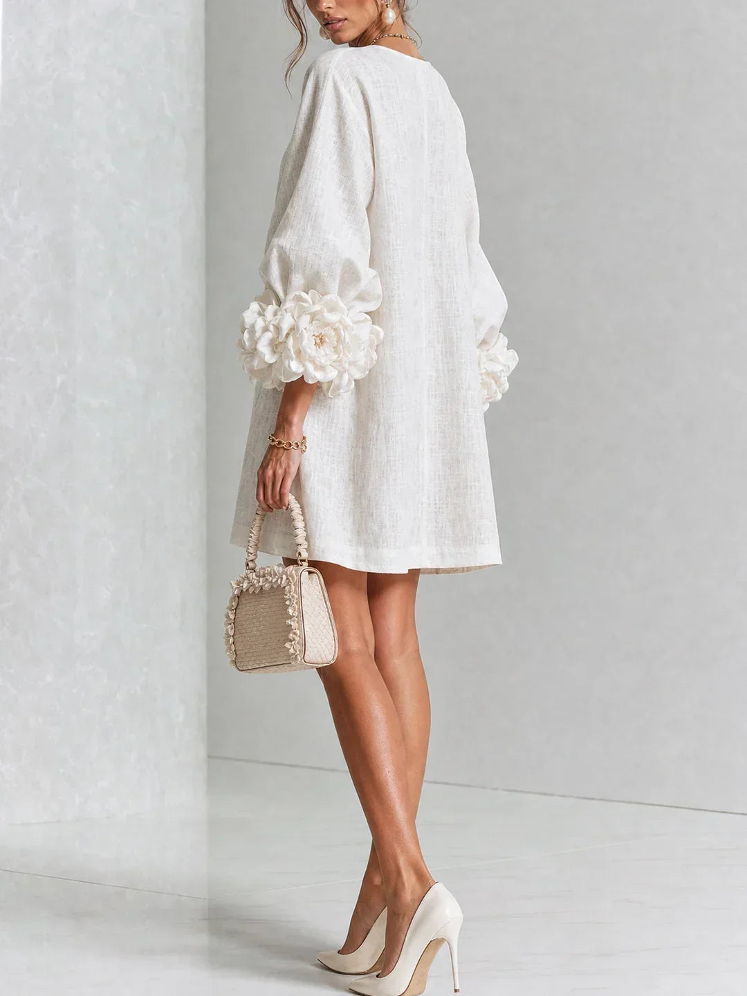 Elvira mini dress in white, back view