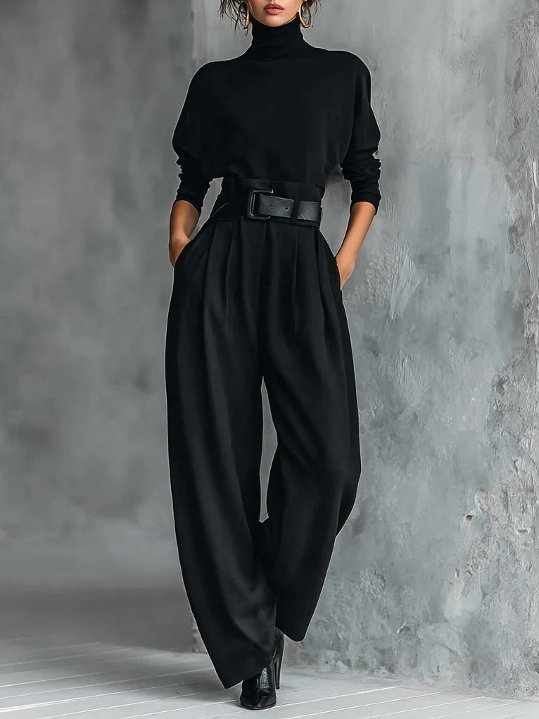 Noëlla turtleneck and trouser set in black, full-length front view