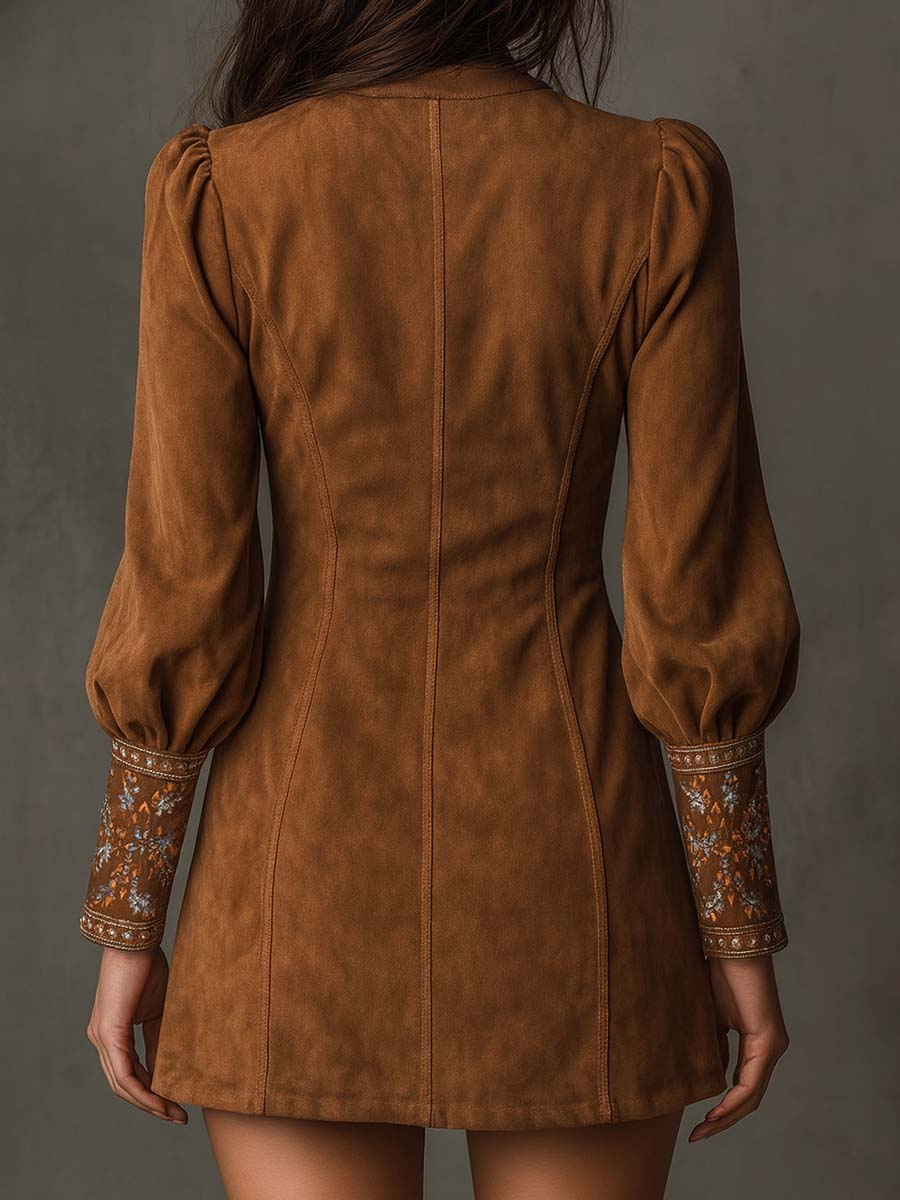 Izolda embroidered mini dress in brown, back view with seamed panels