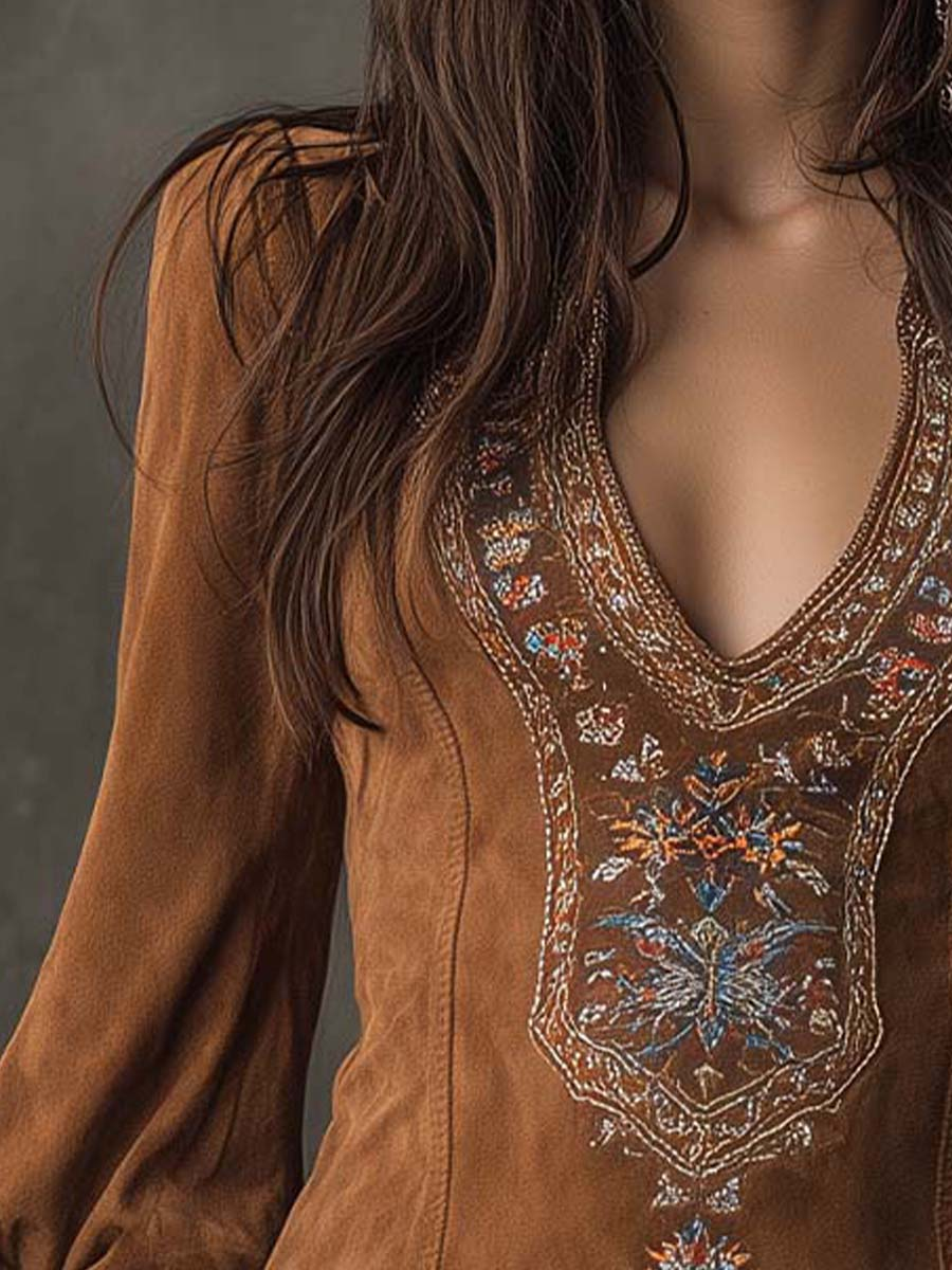Izolda mini dress in brown, close-up of floral embroidery at the neckline