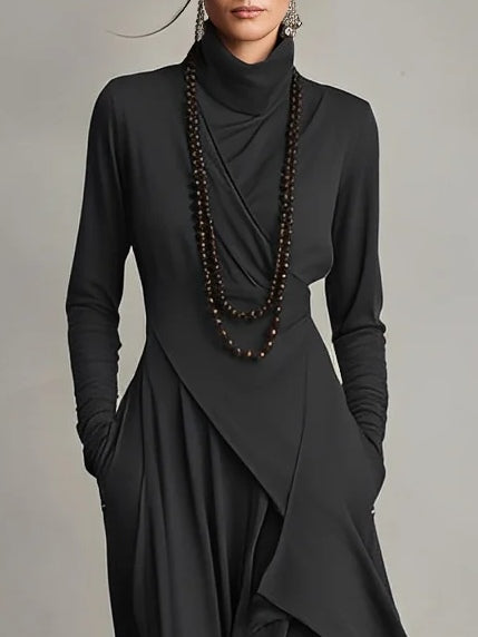 Nellie maxi dress in black, close-up of draped neckline and wrap detail