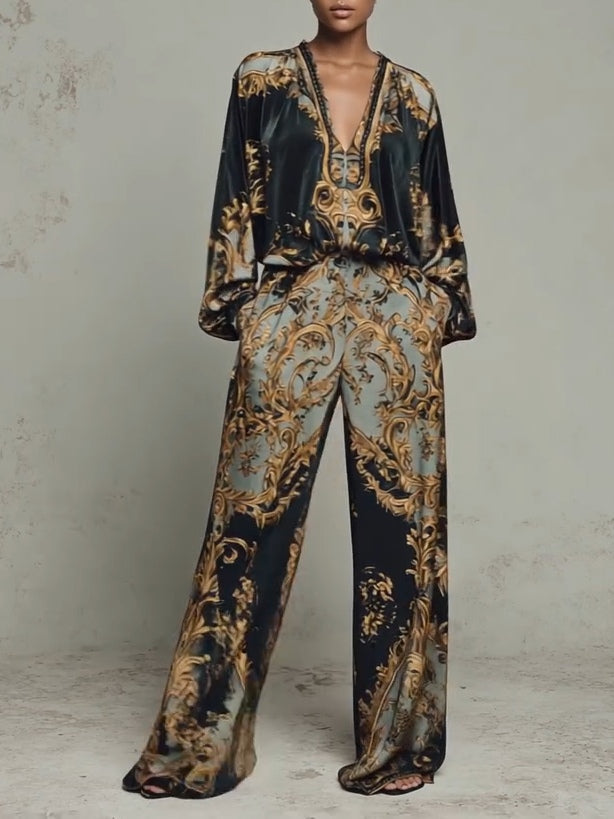 Isabella two-piece velvet suit in black and gold, front view with wide-leg trousers