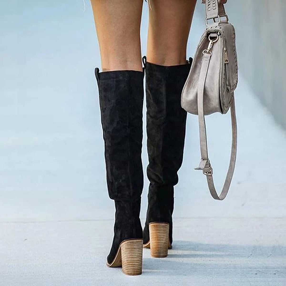 Fern knee-high boots in black, back view of stacked heels