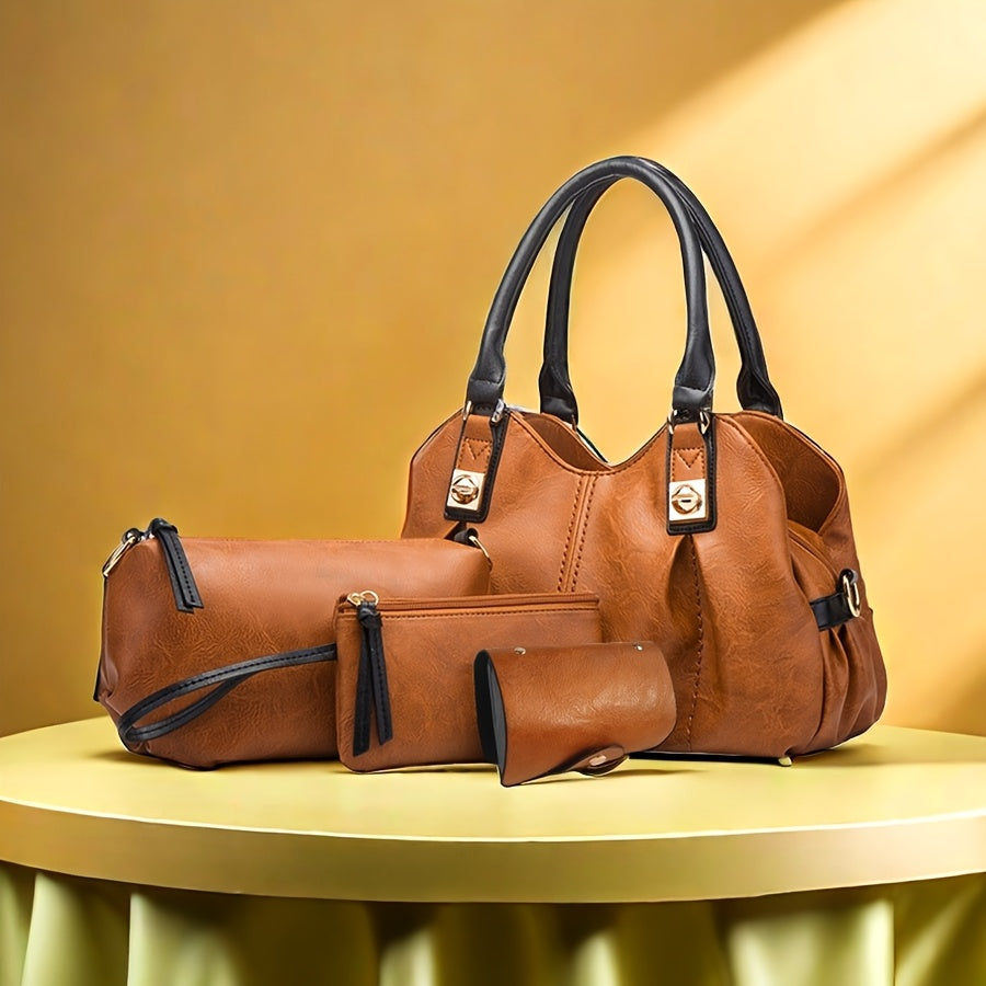 Zoe vintage bag set in tan brown styled on a table against a golden backdrop