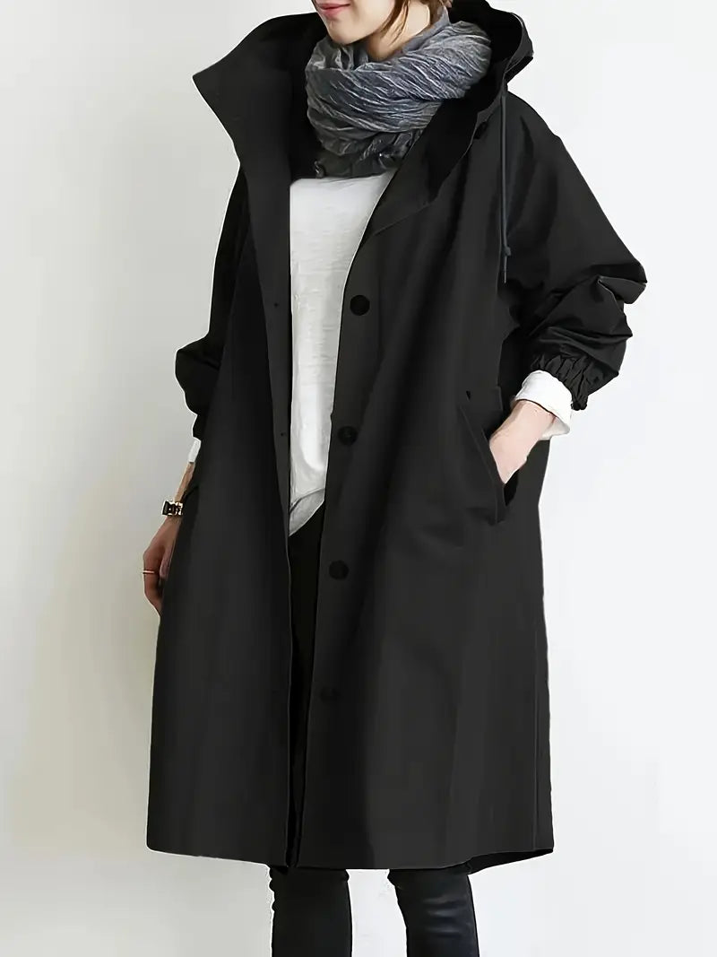 Callindra hooded trench coat in black, front view worn open