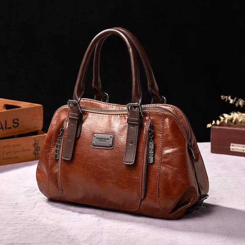 Eveline chic handbag in brown, front view with twin zips