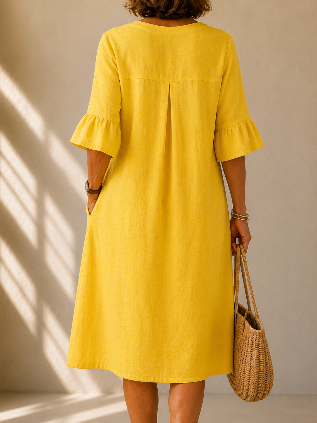 Aveline buttoned relaxed-fit dress in yellow, back view with box pleat