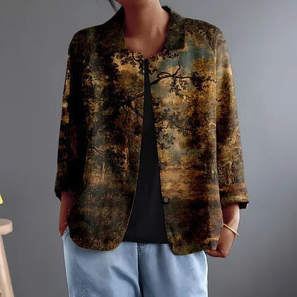 Fiorenza blouse in Black Forest painterly print, worn open over black with jeans